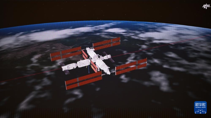 这是4月26日在北京航天飞行控制中心拍摄的成功对接后的神舟十八号载人飞船和空间站组合体的模拟画面。新华社记者 金良快 摄